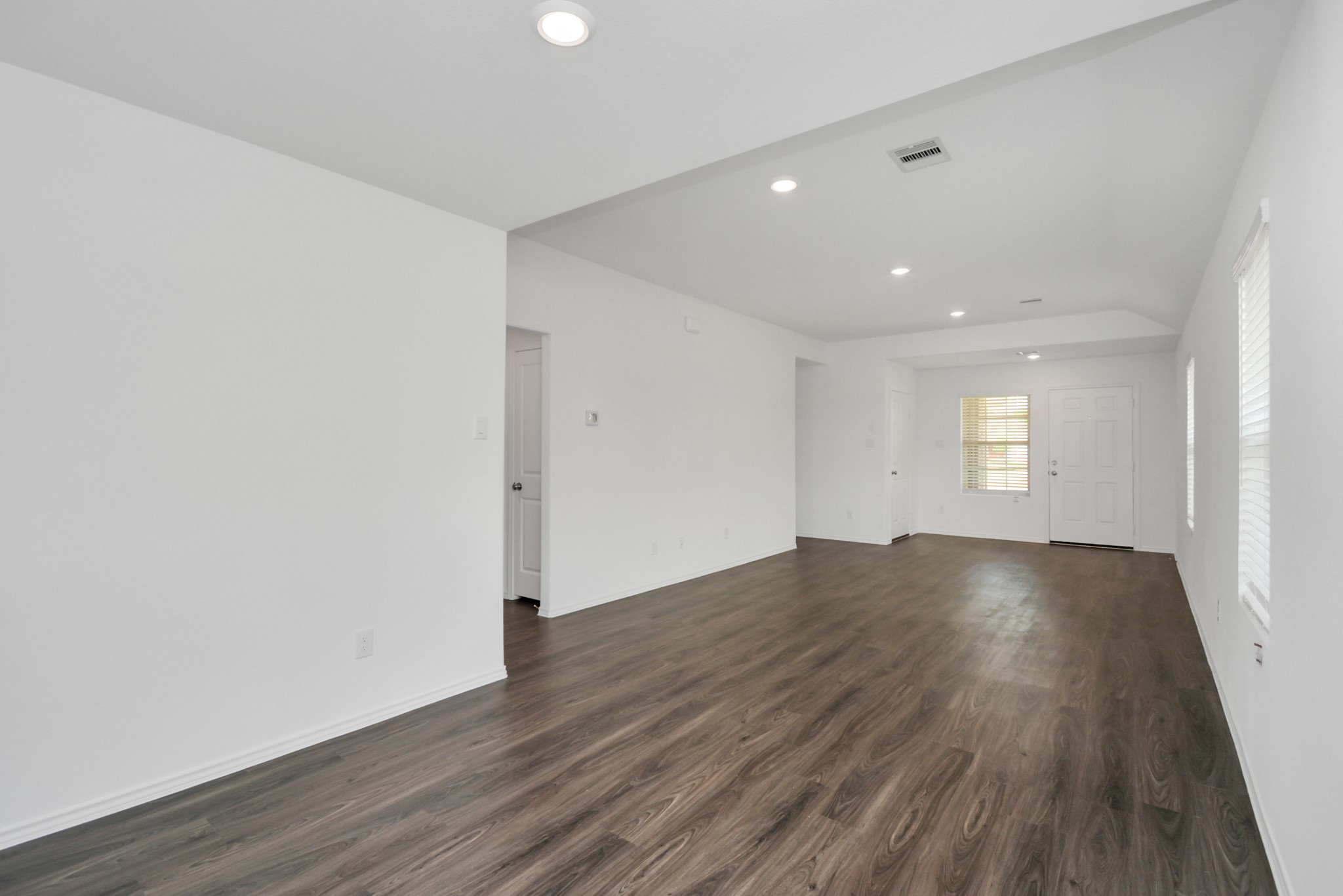 5035 Caledonia Lake Lane Rosharon, TX 77583 - Photo 31 of 37 an empty room with wooden floor and window