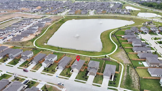 an aerial view of a swimming pool and a terrace