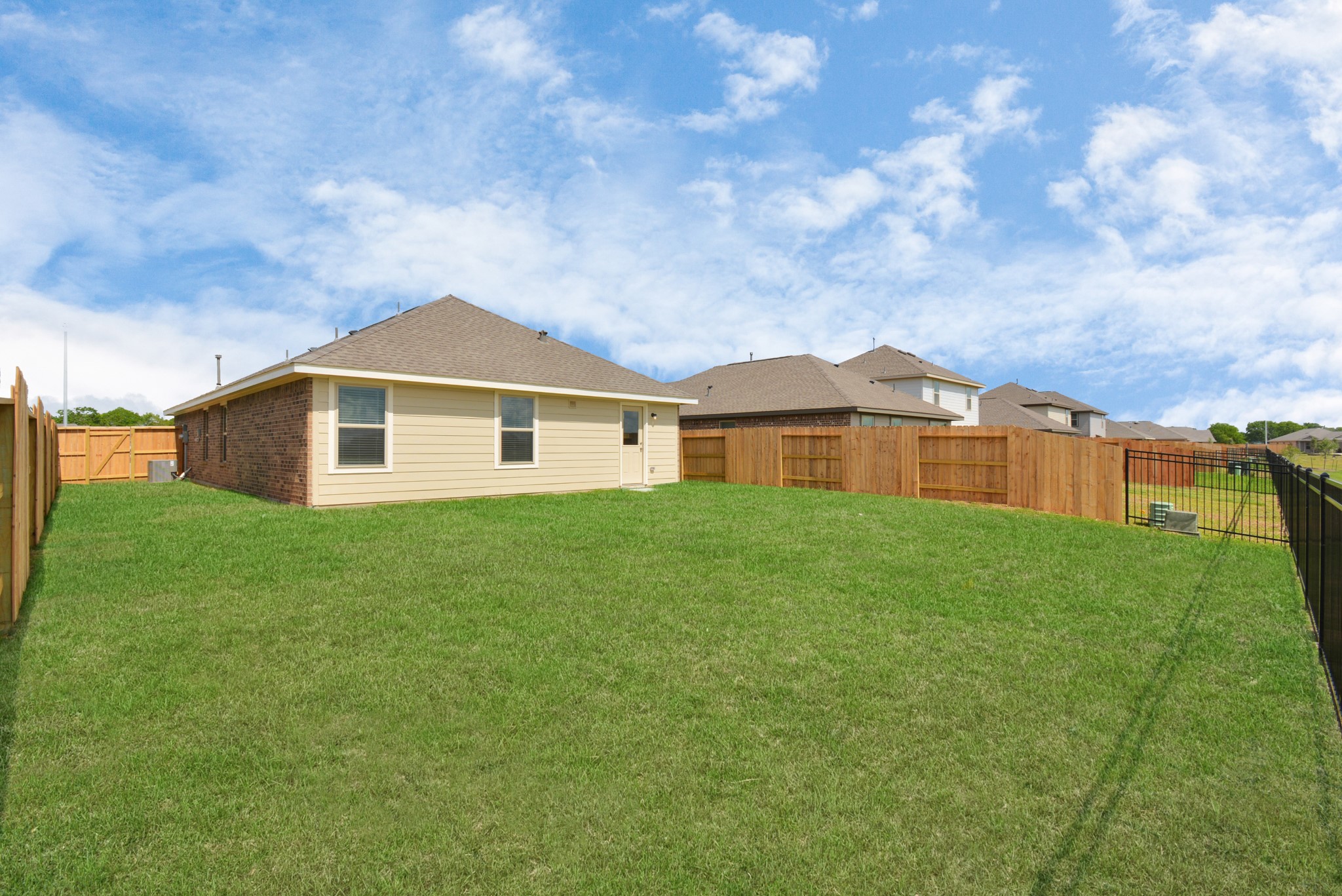 5035 Caledonia Lake Lane Rosharon, TX 77583 - Photo 6 of 37 a view of a house with a big yard