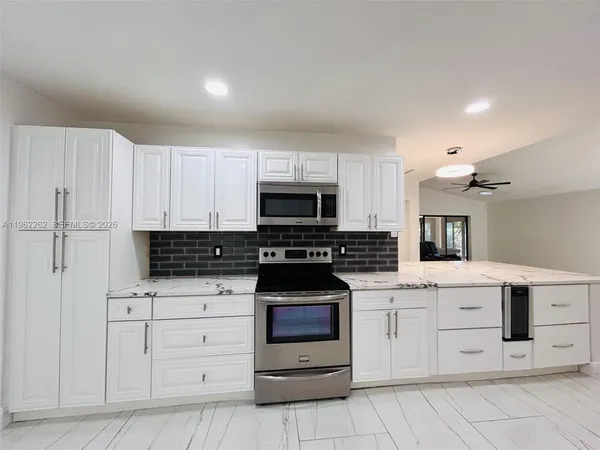 a view of a hallway with windows