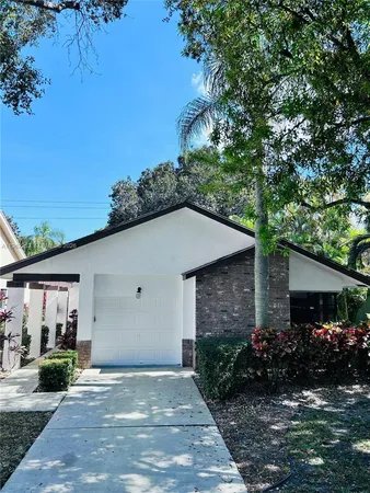 a front view of house with yard