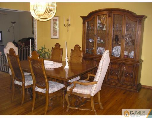 28 Fishel Road Edison, NJ 08820 - Photo 3 of 10 a view of a dining room with furniture and wooden floor