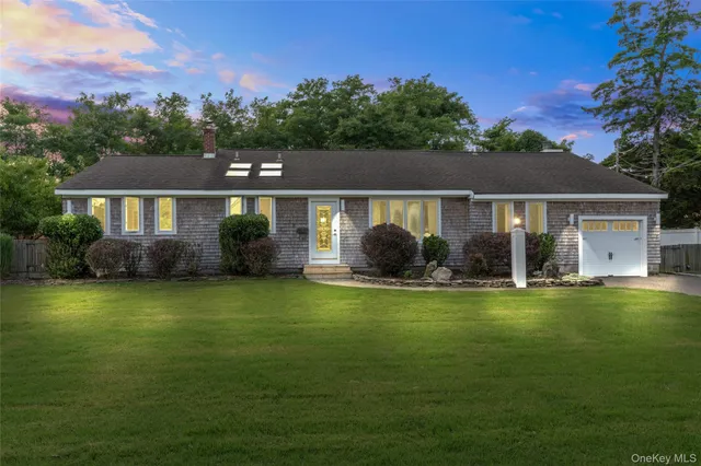 a view of a house with a big yard