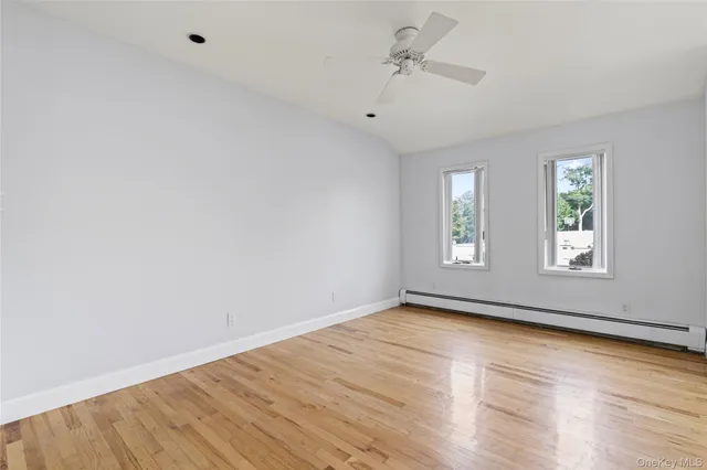 a bathroom with a toilet a sink and a shower