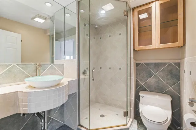 a living room with fireplace furniture and a flat screen tv