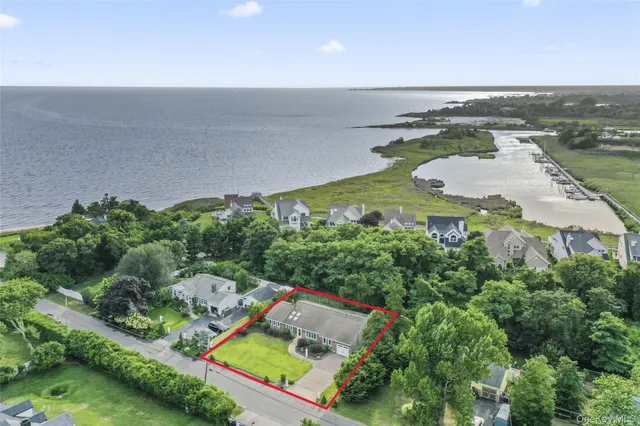 an aerial view of a house with a garden
