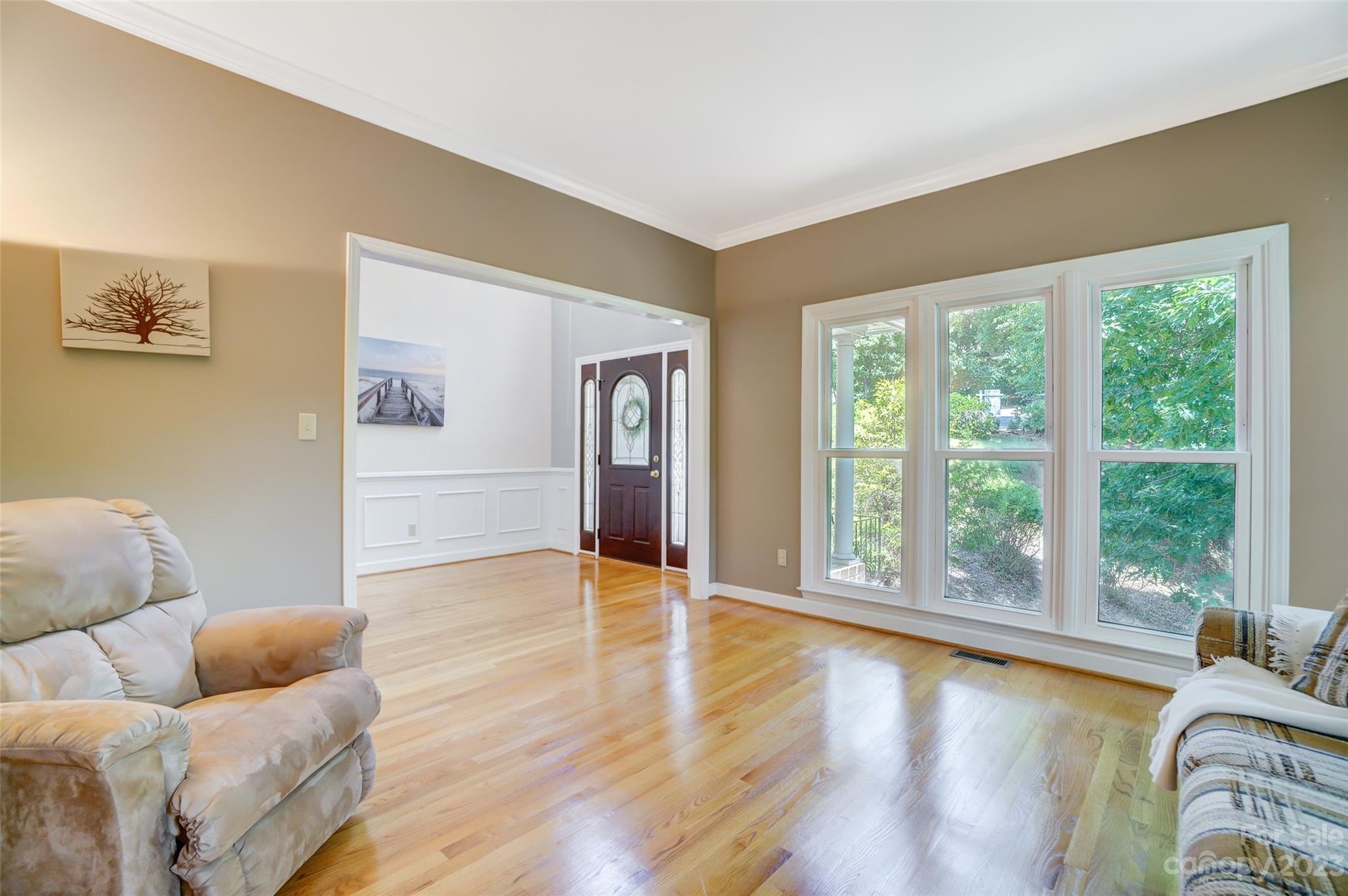 29025 Beaver Run Tega Cay, SC 29708 - Photo 17 of 42 a living room with furniture and a large window
