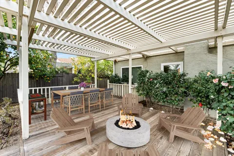 a view of a patio with furniture