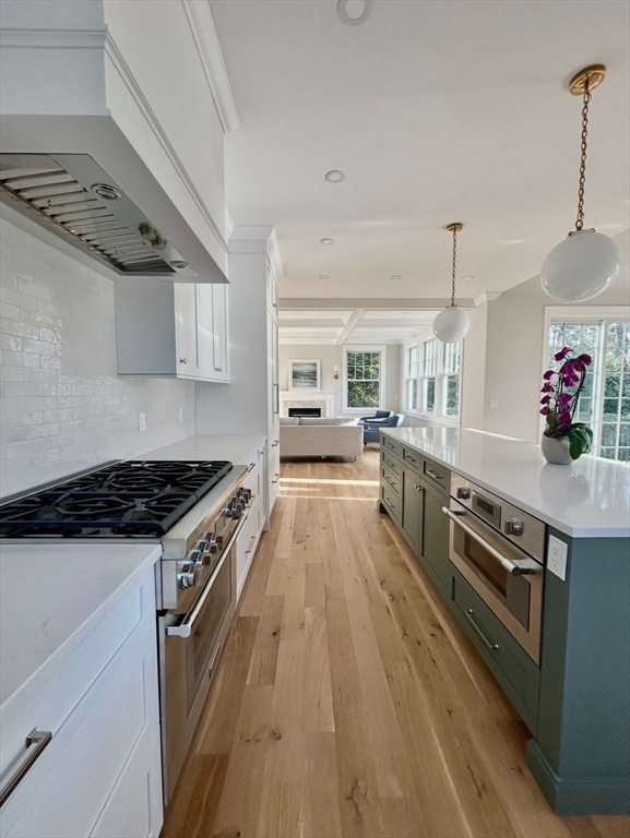 36 Yorkshire Road Dover, MA 02030 - Photo 5 of 9 a kitchen with stainless steel appliances granite countertop a stove and a wooden floors