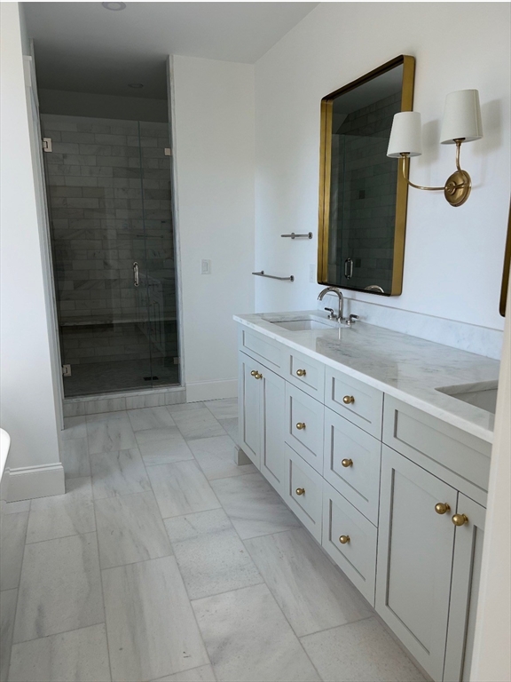 36 Yorkshire Road Dover, MA 02030 - Photo 6 of 9 a bathroom with a granite countertop sink a mirror and a