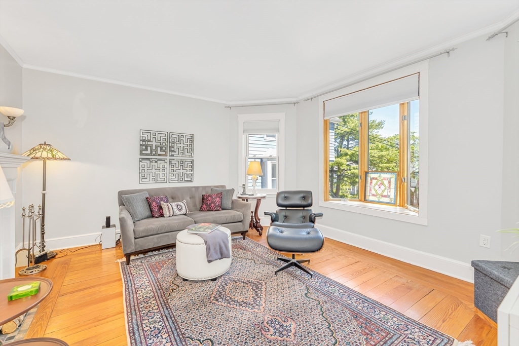 112 Perham Street Boston, MA 02132 - Photo 7 of 36 a living room with furniture and a window