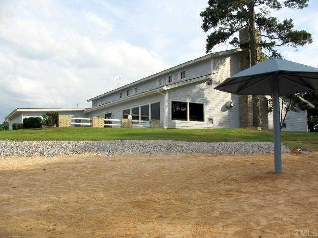 123 Shaman Drive, Unit R3027 Spring Hope, NC 27882 - Photo 4 of 10 a front view of a house with a yard
