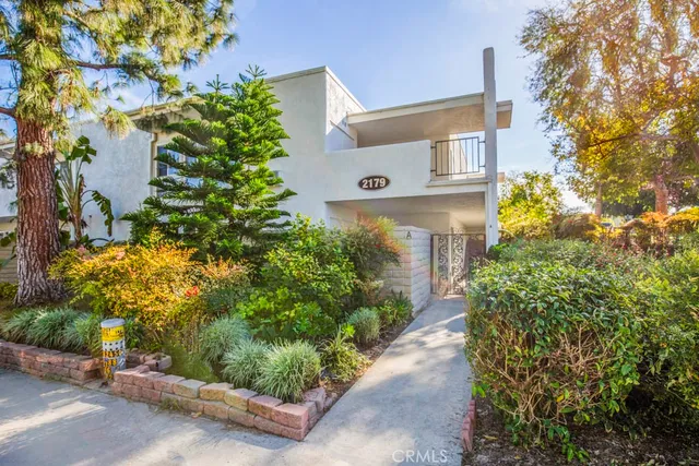 front view of a house with a street