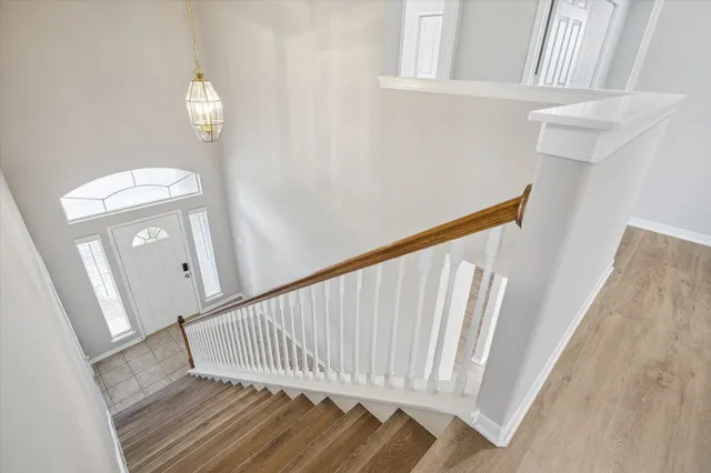 a view of a hallway with windows