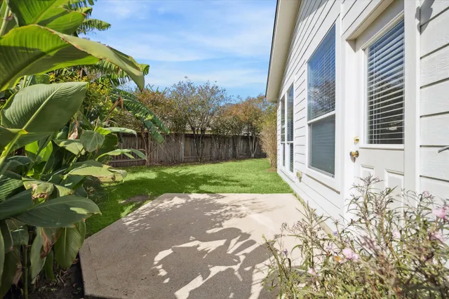 a view of a garden with a pathway
