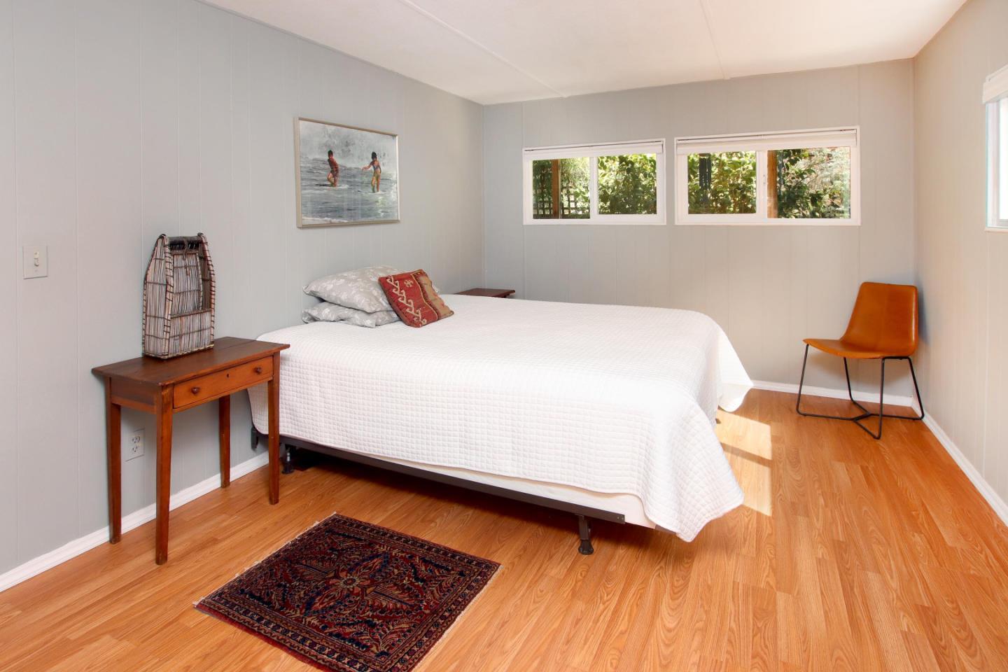 270 Hames Road, Unit 38 Corralitos, CA 95076 - Photo 17 of 35 a bedroom with a bed and chair