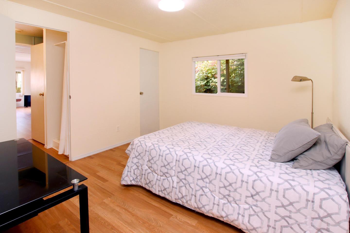 270 Hames Road, Unit 38 Corralitos, CA 95076 - Photo 19 of 35 a bedroom with a bed and a window