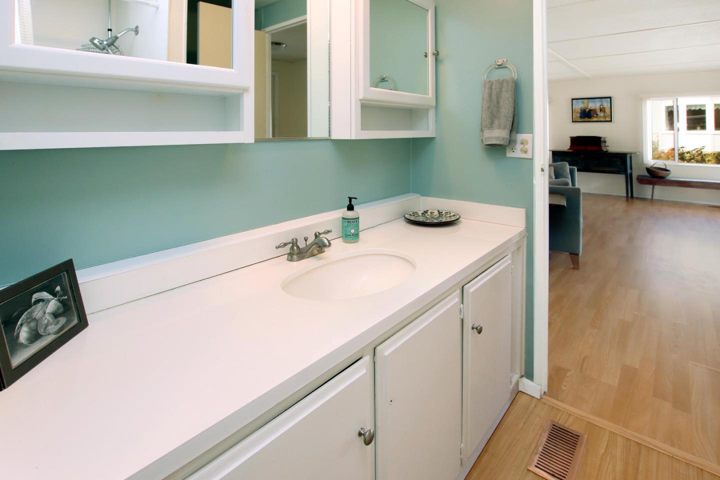 270 Hames Road, Unit 38 Corralitos, CA 95076 - Photo 20 of 35 a utility room with a sink washer and dryer