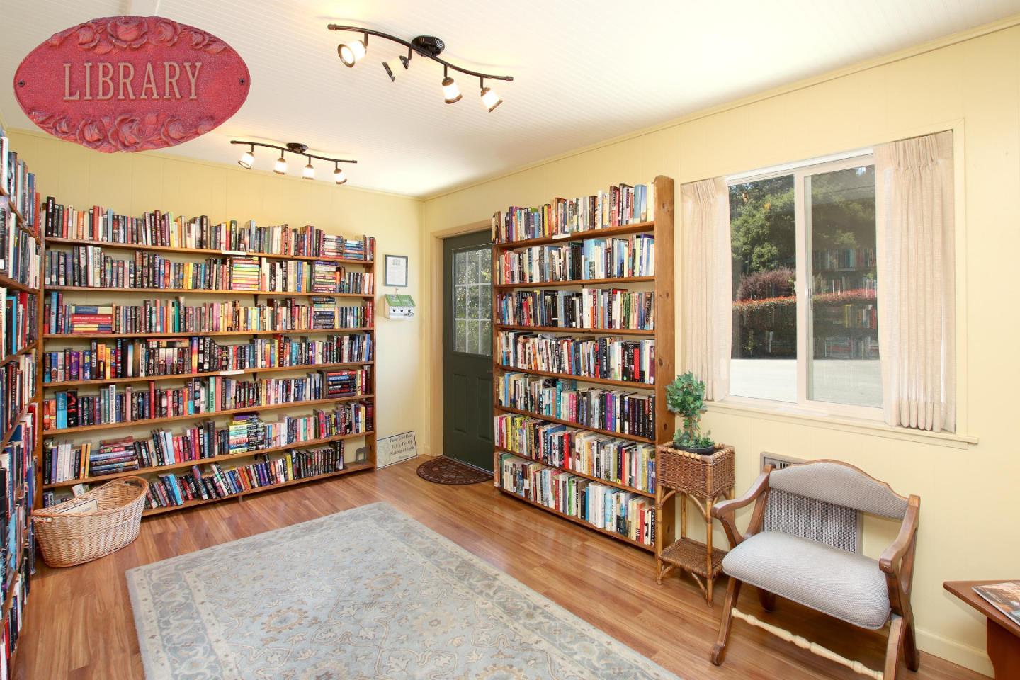 270 Hames Road, Unit 38 Corralitos, CA 95076 - Photo 29 of 35 a living room with furniture and a book shelf