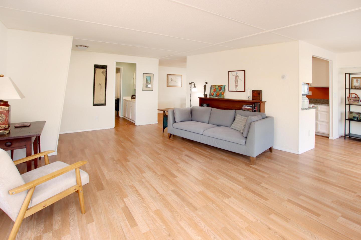 270 Hames Road, Unit 38 Corralitos, CA 95076 - Photo 8 of 35 a living room with furniture and a wooden floor