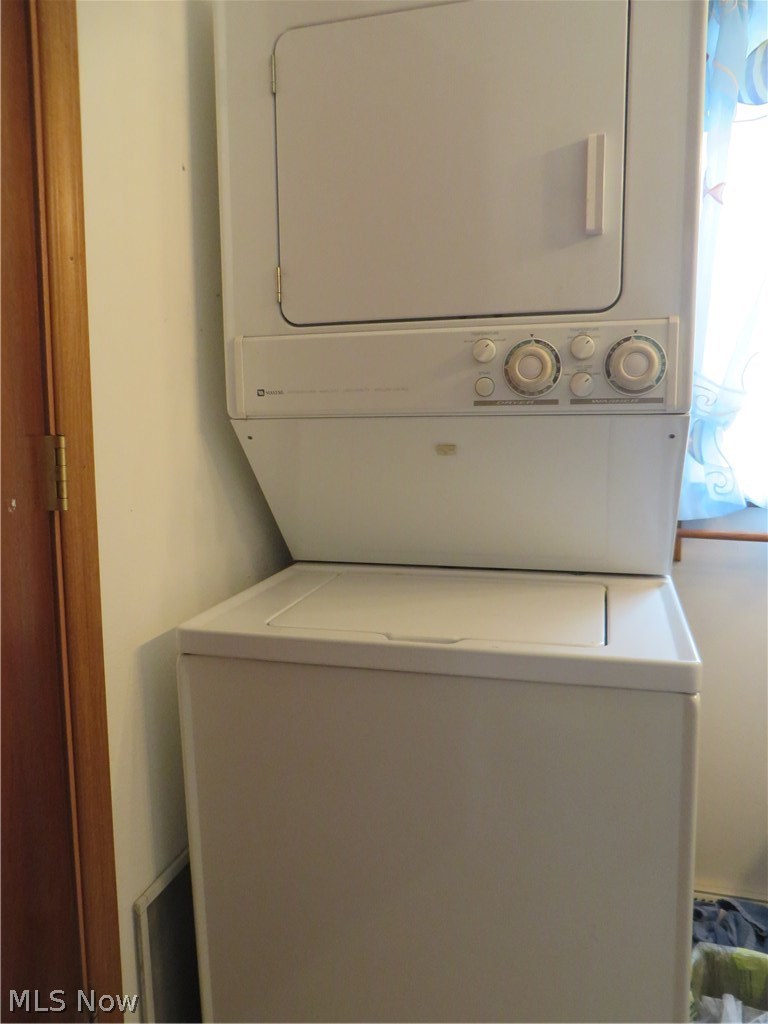 15335 Moseley Road Madison, OH 44057 - Photo 13 of 34 Stackable washer and dryer stays in additional living suite.