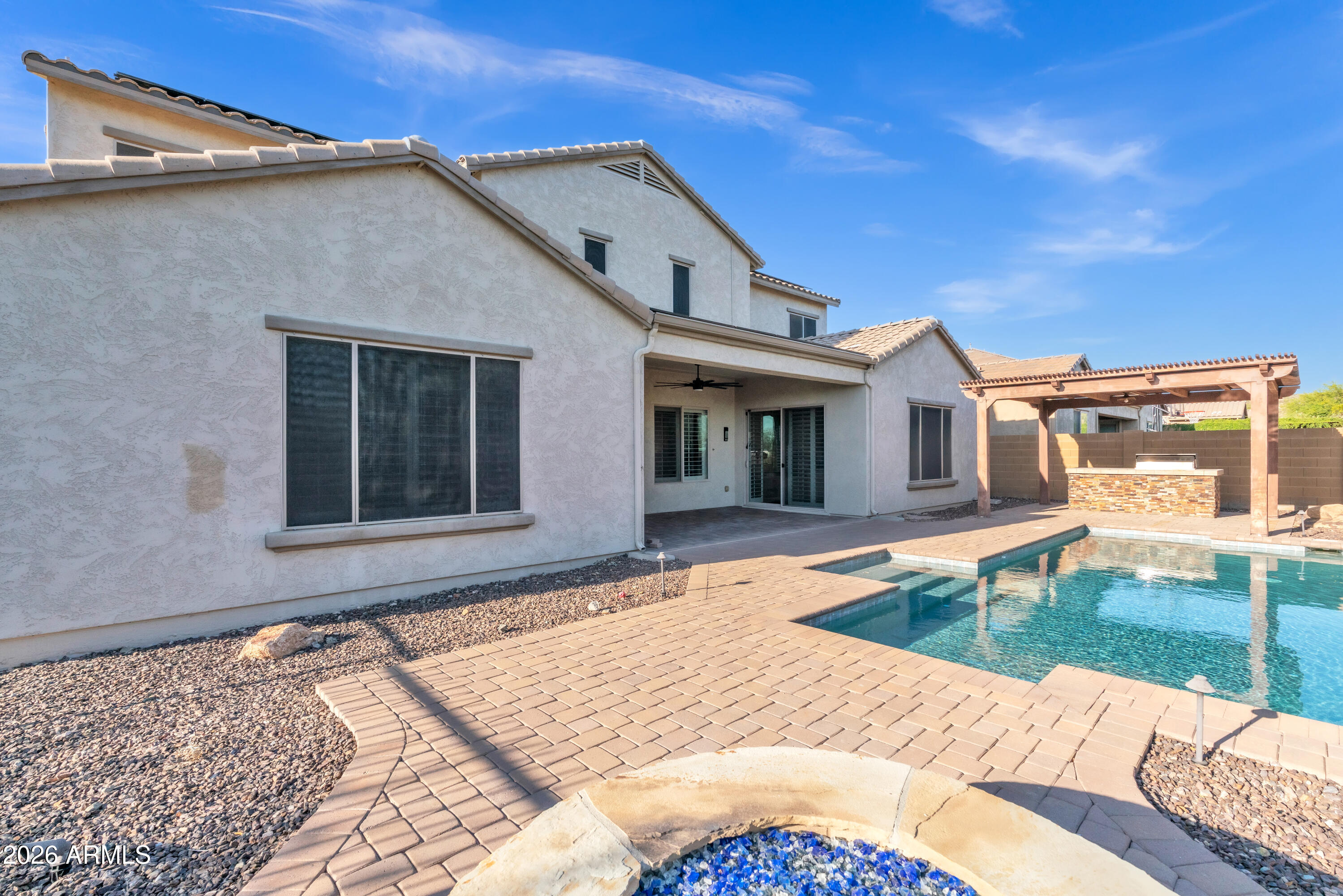 1615 West Red Fox Road Phoenix, AZ 85085 - Photo 49 of 64 a view of a house with a patio