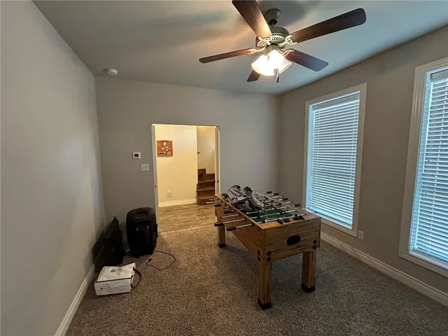 a room with furniture and window