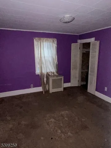 a view of an empty room with window