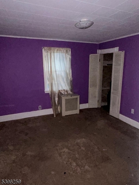 114 Ely Street Elizabeth, NJ 07202 - Photo 11 of 13 a view of an empty room with window