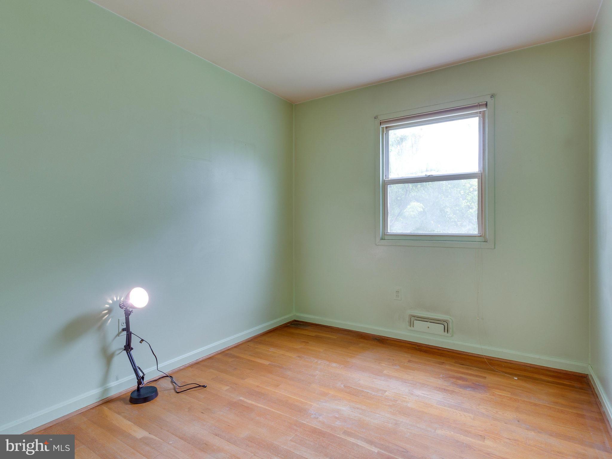 8207 Old Oaks Drive Springfield, VA 22152 - Photo 13 of 30 an empty room with a window