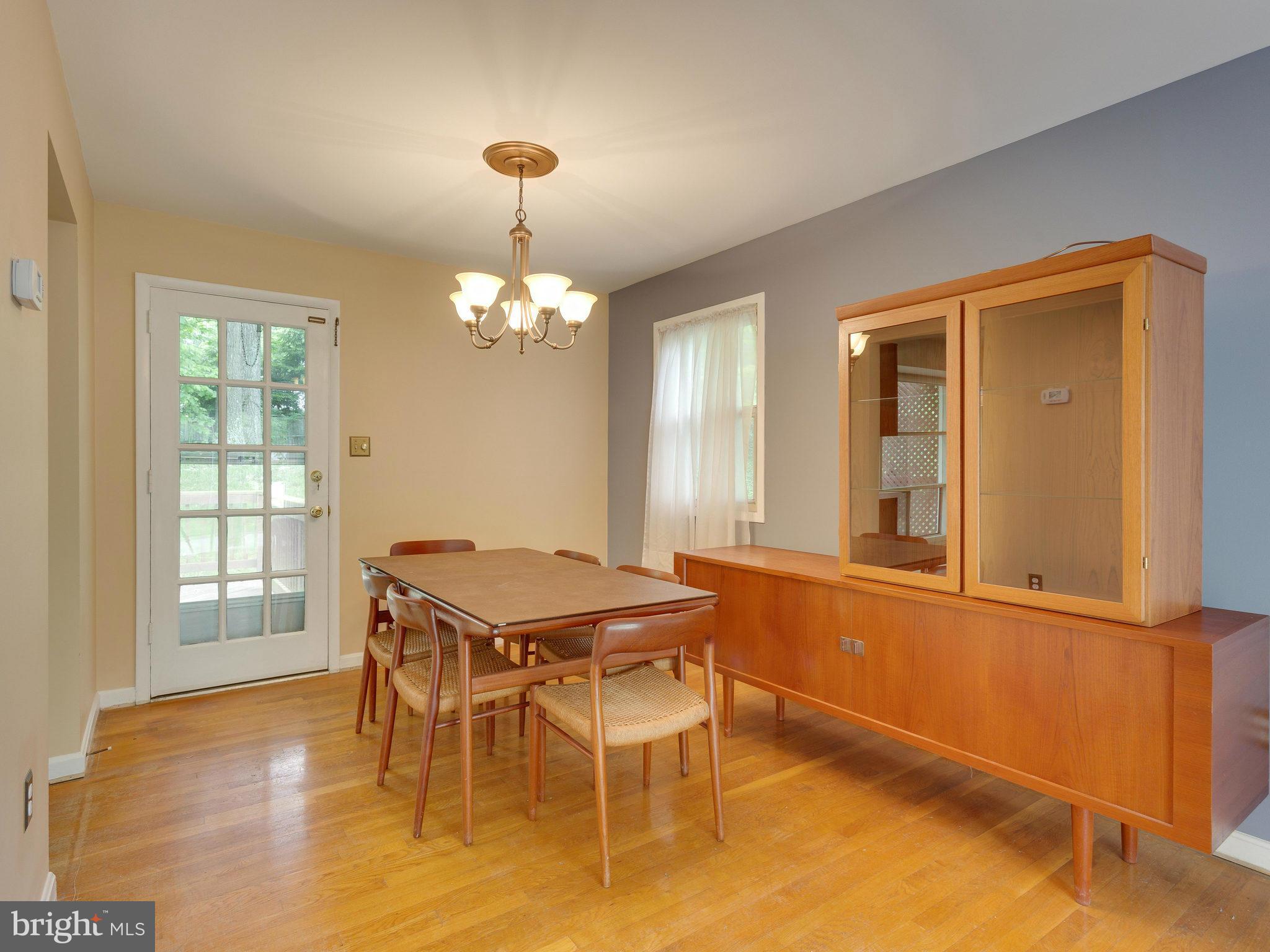 8207 Old Oaks Drive Springfield, VA 22152 - Photo 6 of 30 a dining room with furniture and window