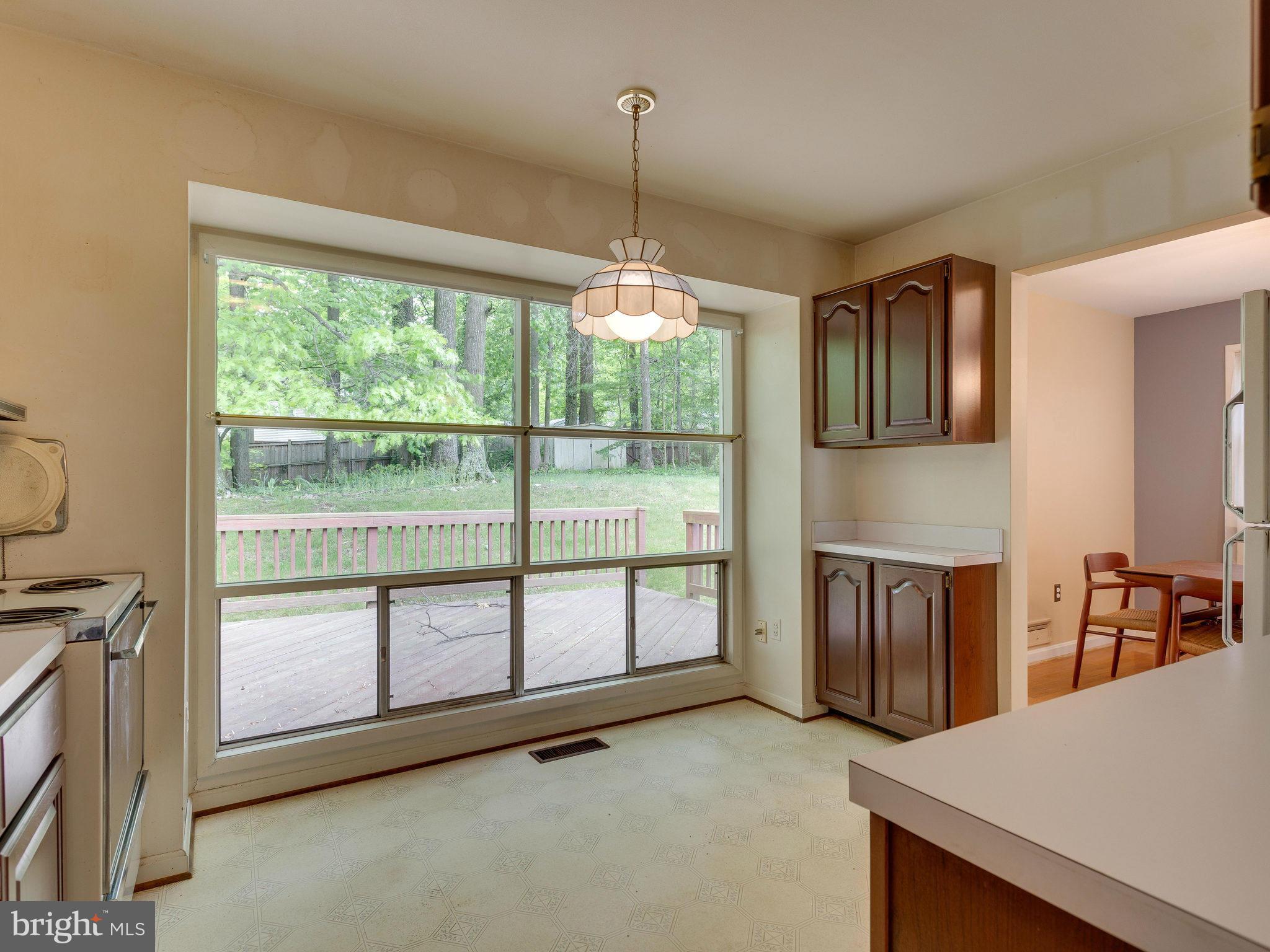 8207 Old Oaks Drive Springfield, VA 22152 - Photo 8 of 30 a view of hallway with furniture and floor to ceiling window