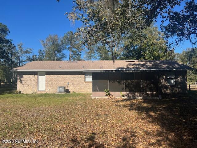 312 East Market Road Starke, FL 32091 - Photo 17 of 46 a view of a house with a yard