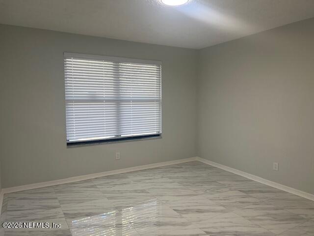 312 East Market Road Starke, FL 32091 - Photo 37 of 46 an empty room with a window