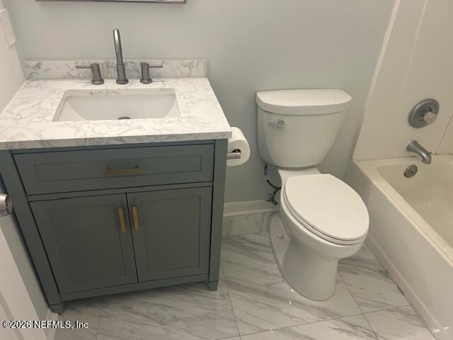 312 East Market Road Starke, FL 32091 - Photo 38 of 46 a bathroom with a toilet sink and mirror