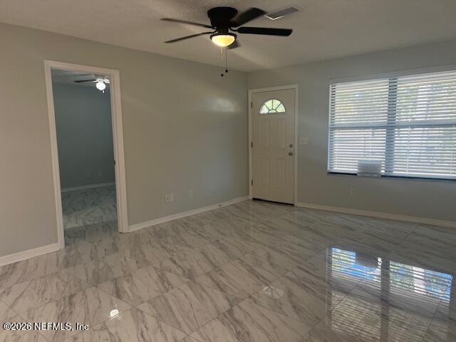 312 East Market Road Starke, FL 32091 - Photo 40 of 46 wooden floor in an empty room with a window