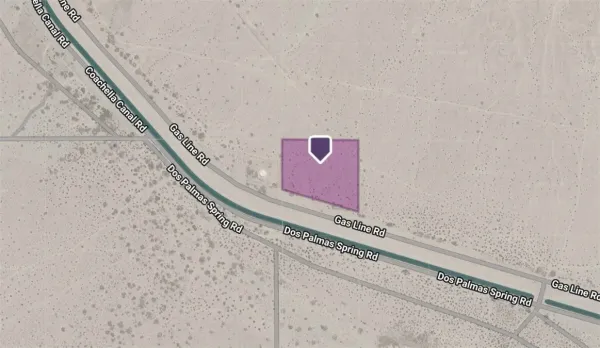 a sign board with a snow on the road