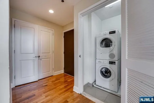 a view of a storage & utility room with washer and dryer