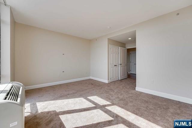 29 1st Street, Unit 401 Hackensack, NJ 07601 - Photo 16 of 26 a view of an empty room