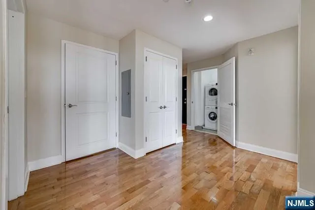 a bathroom with a granite countertop sink mirror and double