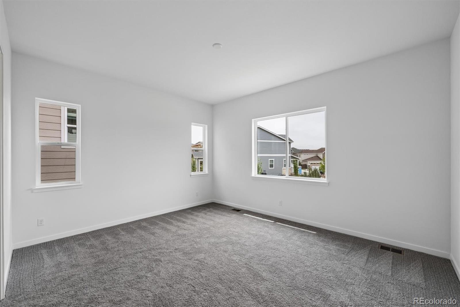 2516 West Bitterroot Place Highlands Ranch, CO 80129 - Photo 14 of 24 a view of an empty room with a window