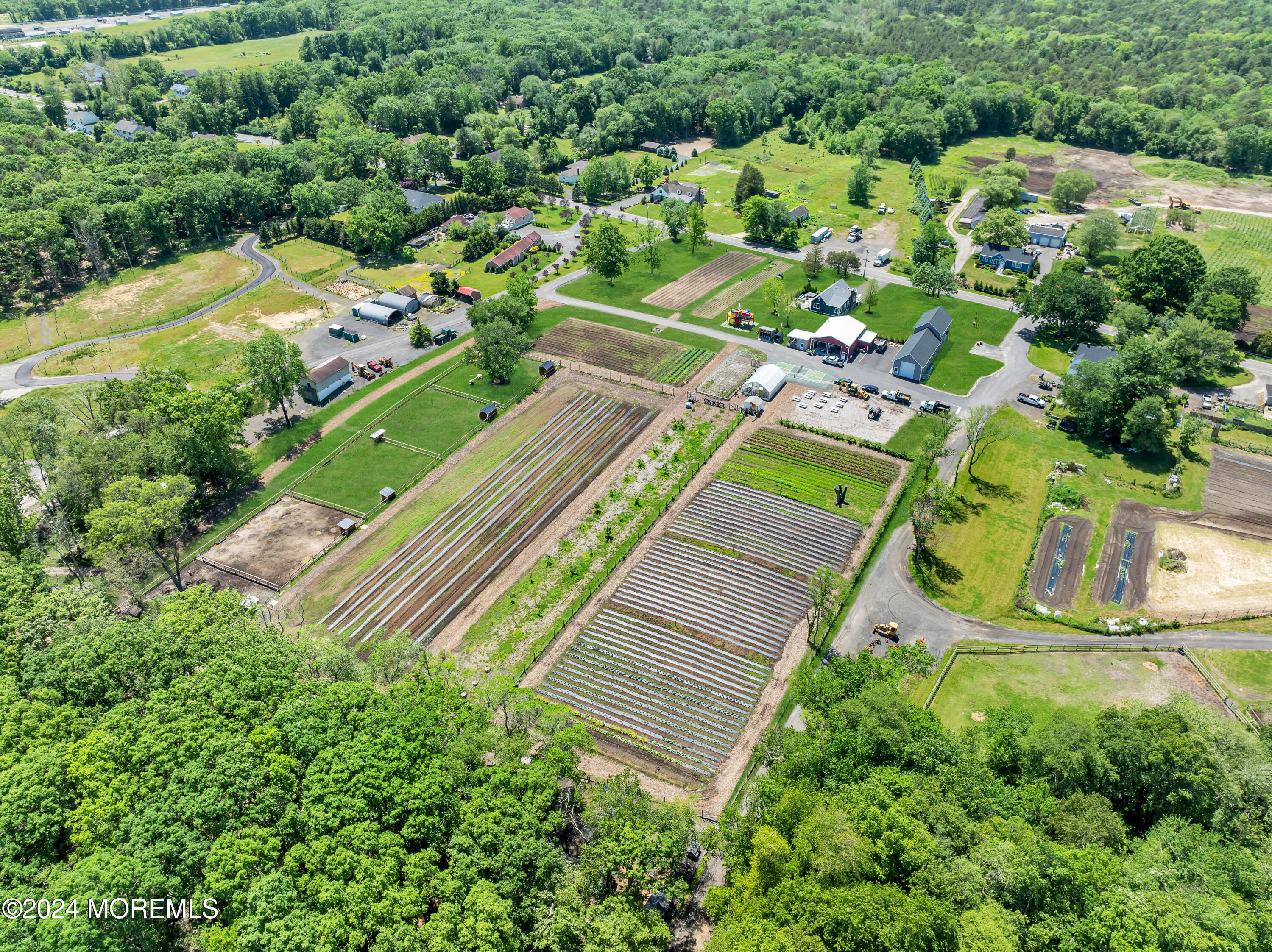 553 Colts Neck Road Farmingdale, NJ 07727 - Photo 13 of 52 an aerial view of a residential houses with yard
