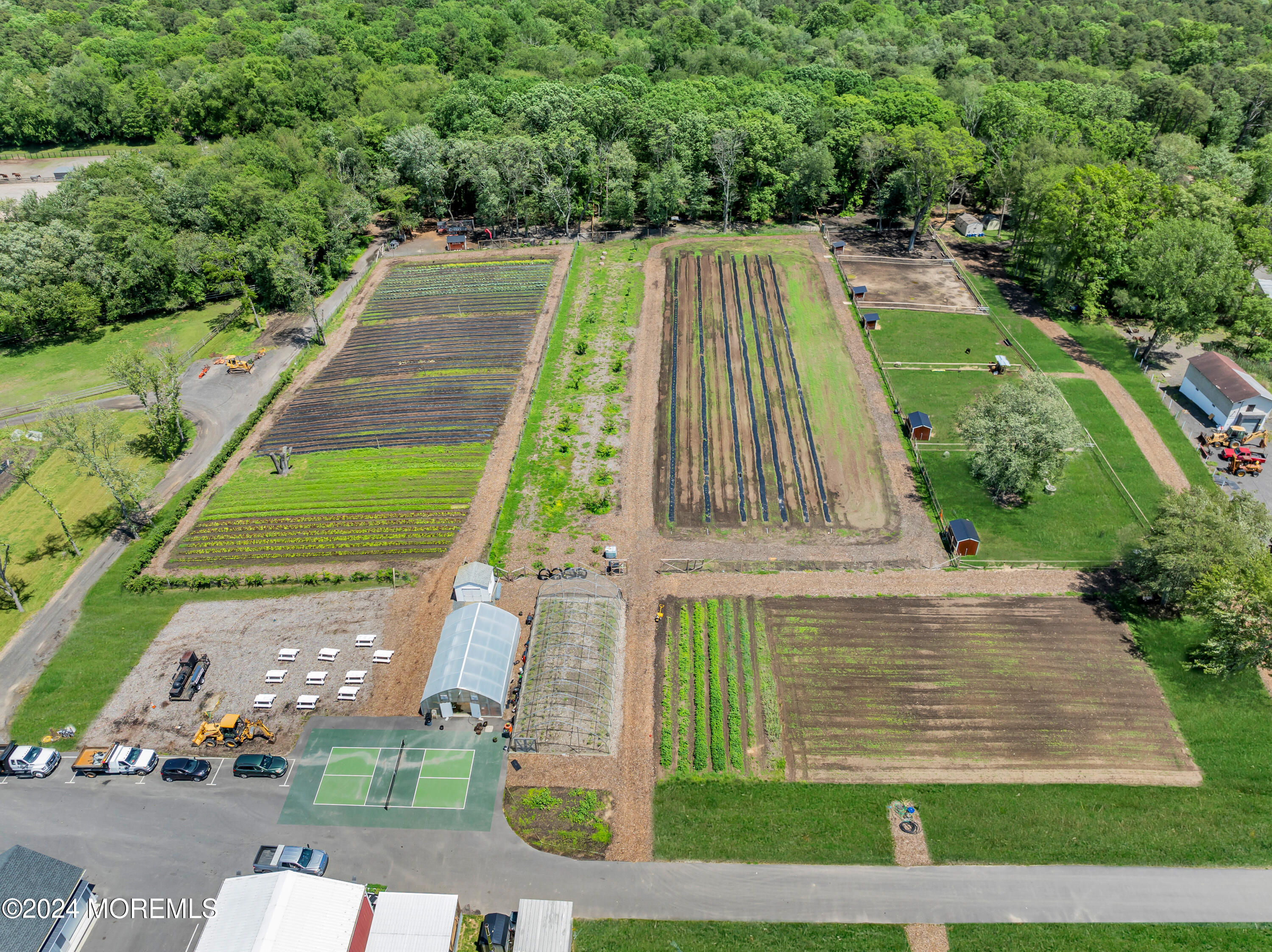 553 Colts Neck Road Farmingdale, NJ 07727 - Photo 18 of 52 an aerial view of a house with a yard