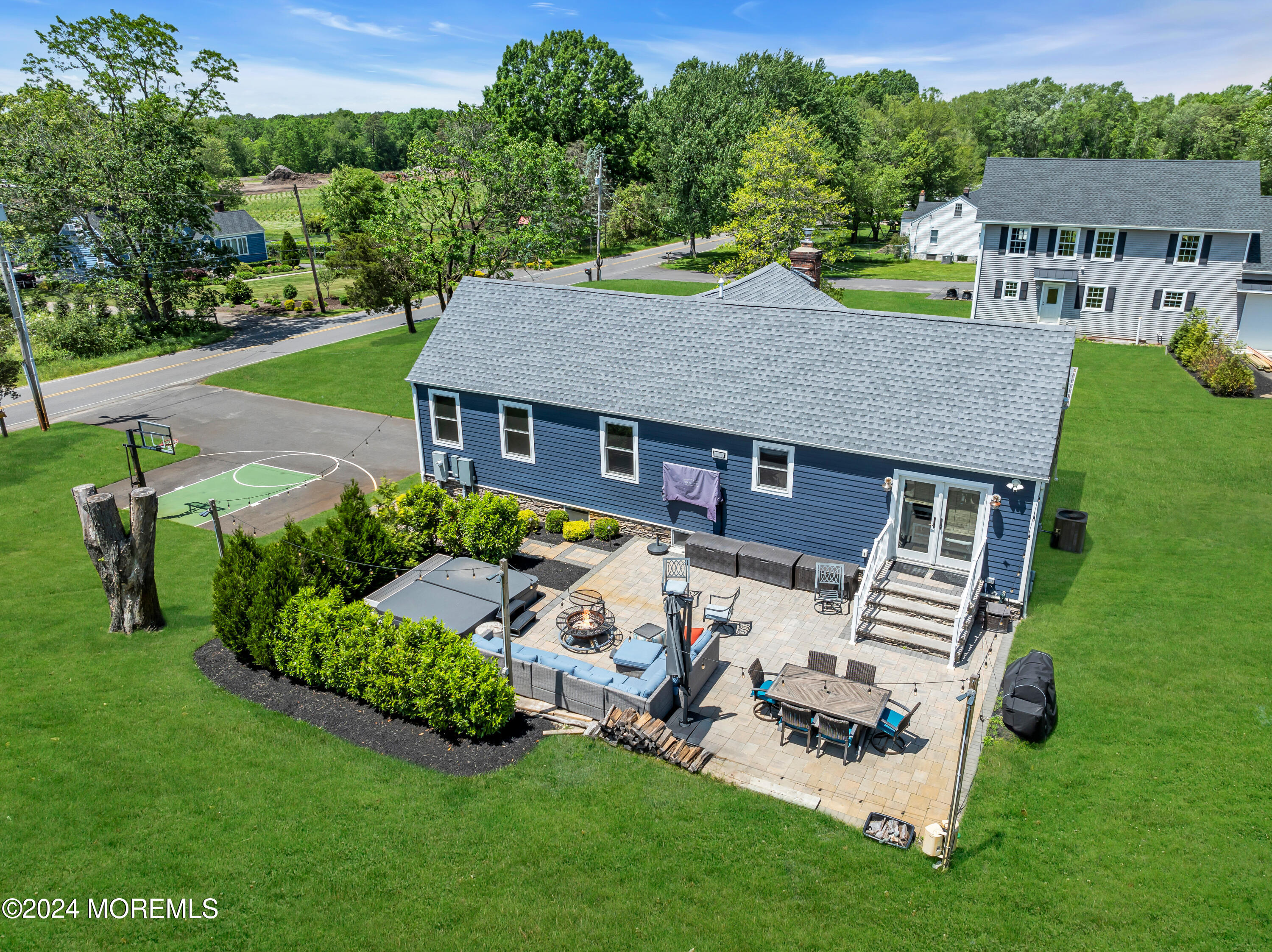553 Colts Neck Road Farmingdale, NJ 07727 - Photo 21 of 52 an aerial view of a house with swimming pool garden and patio