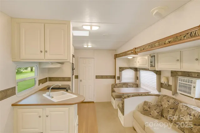 a kitchen with stainless steel appliances a stove and a refrigerator