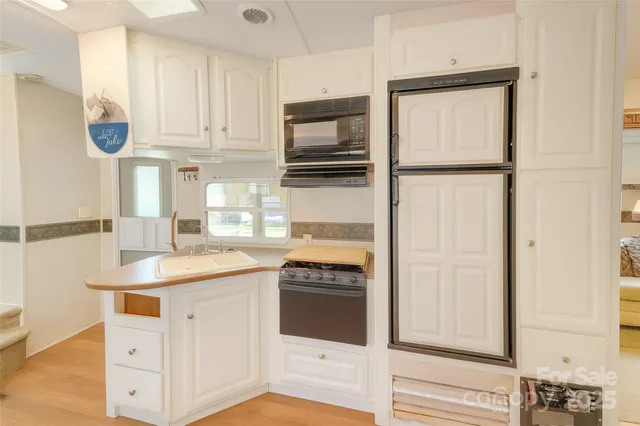 a living room with a couch and a stove