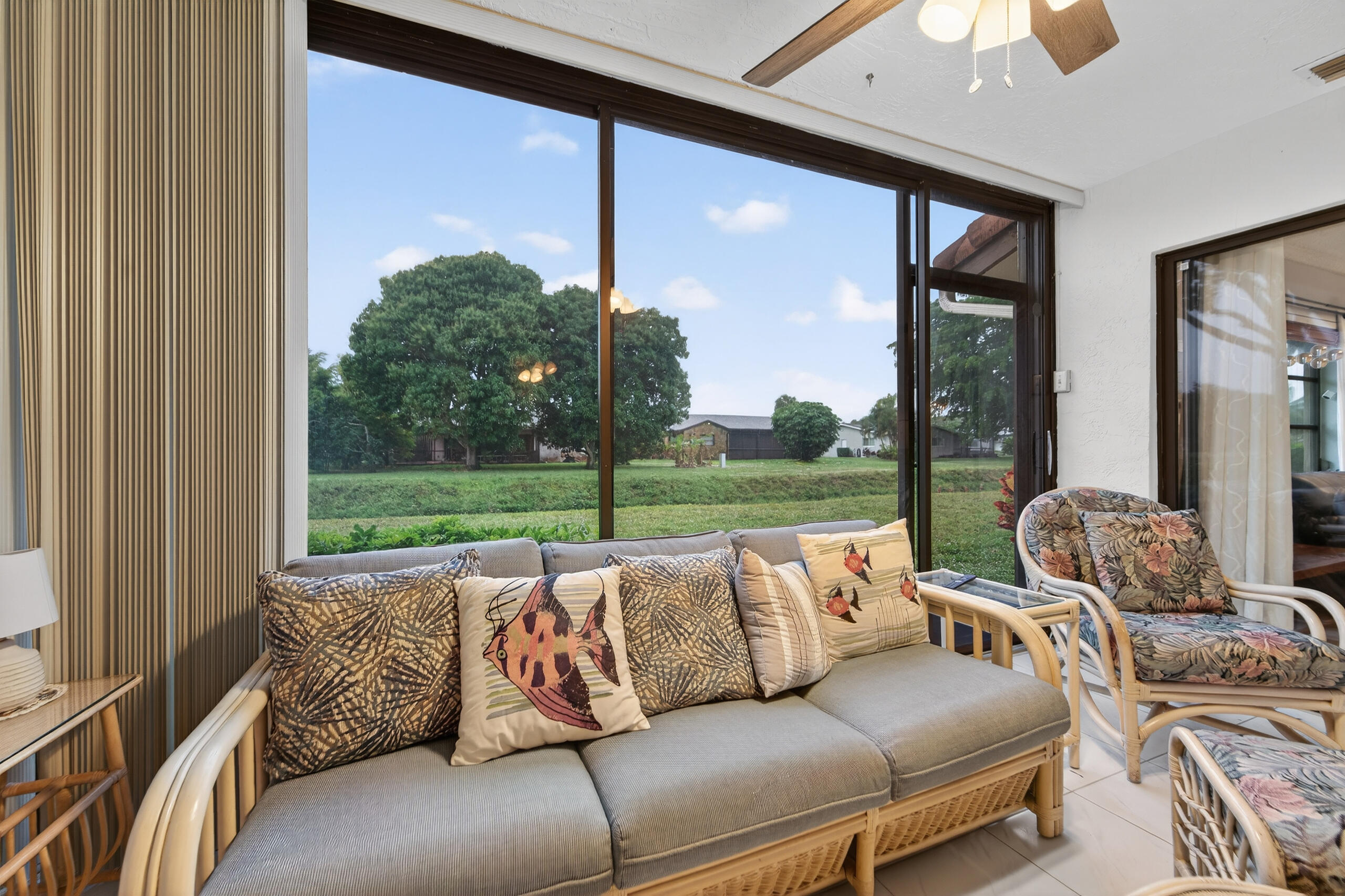 6220 Kings Gate Circle Delray Beach, FL 33484 - Photo 14 of 59 a balcony with furniture and a floor to ceiling window