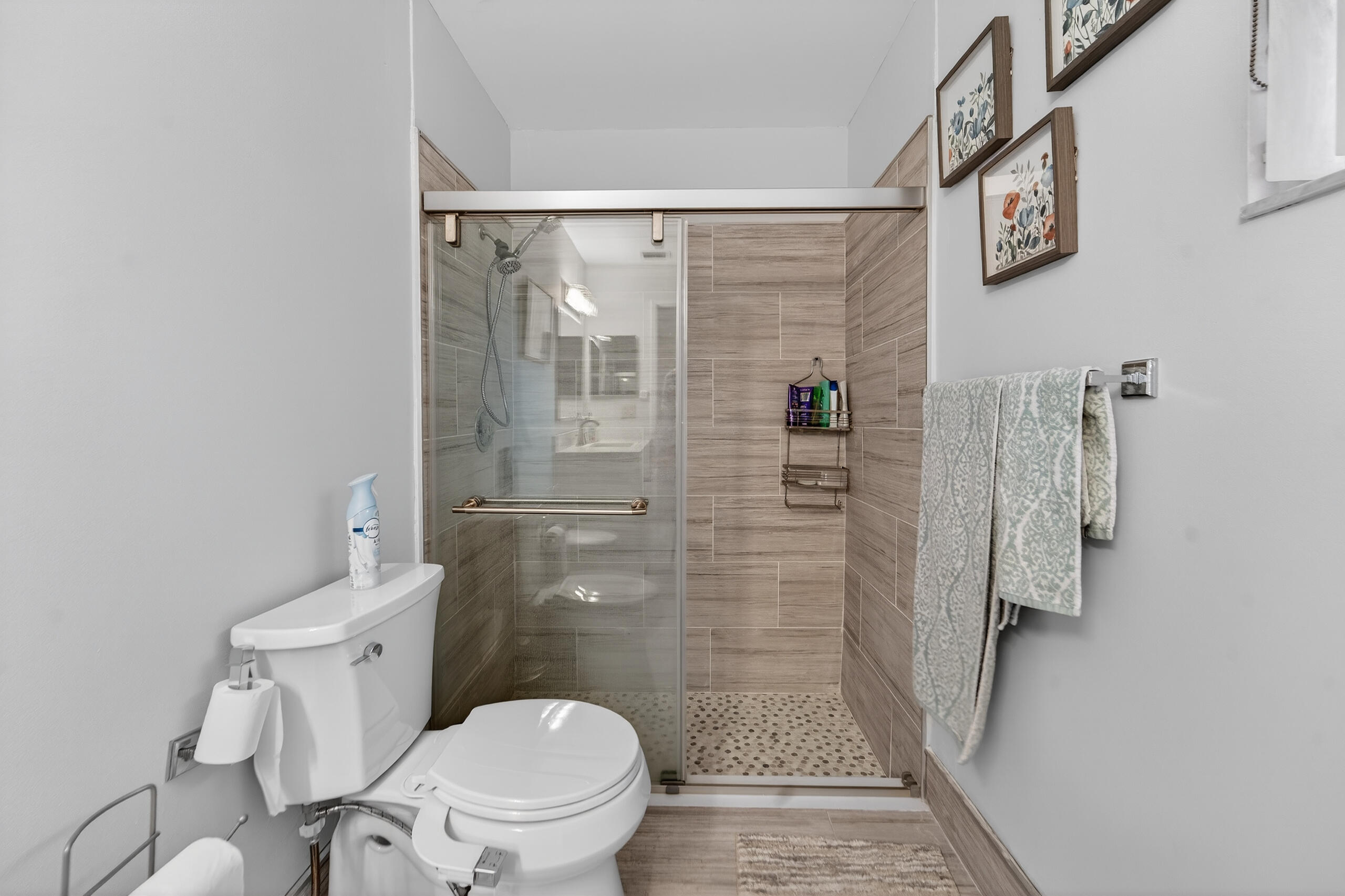 6220 Kings Gate Circle Delray Beach, FL 33484 - Photo 21 of 59 a bathroom with a toilet and a shower