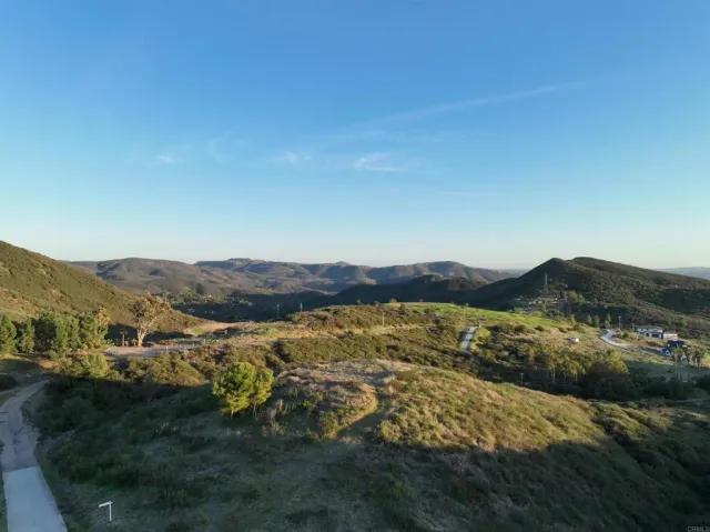 a view of a house with a mountain