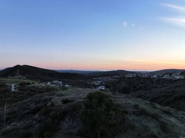 a view of a house with a mountain